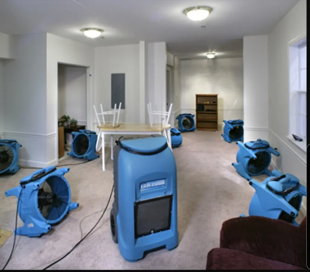 Air movers and dehumidifier setup for Water Damage Restoration in Woodland